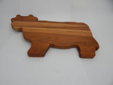 Cow shaped cutting boards.
